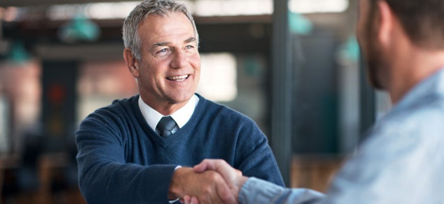 Insurance agent helping a client. 