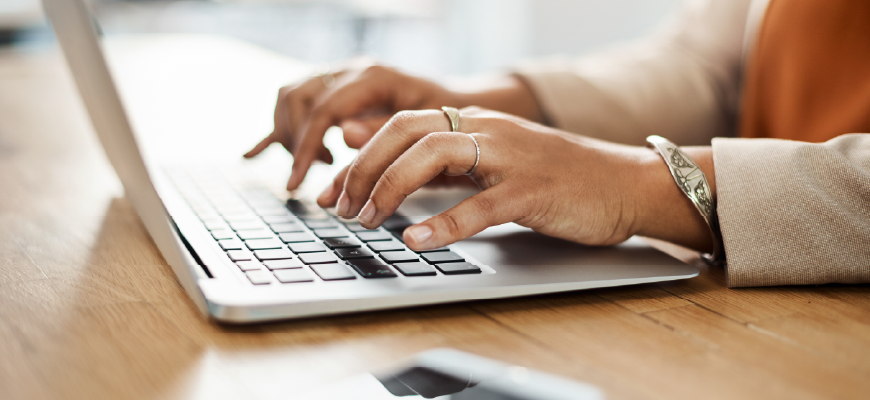 Health insurance agent working on a computer 