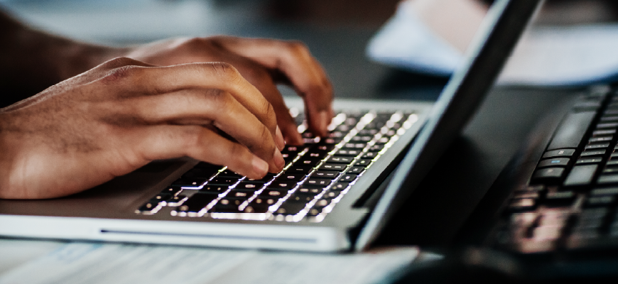 Health insurance agent working on a computer 