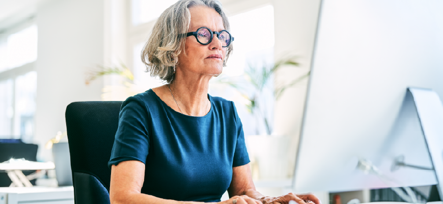 Health insurance agent working on a computer 