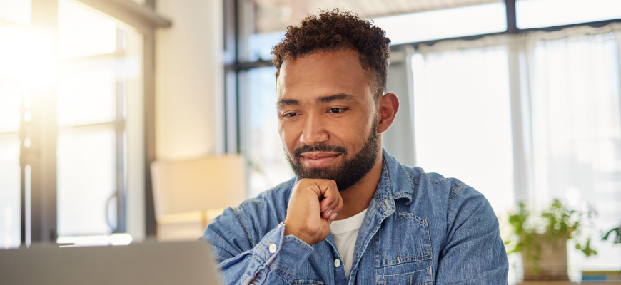 Health insurance agent working on a computer 