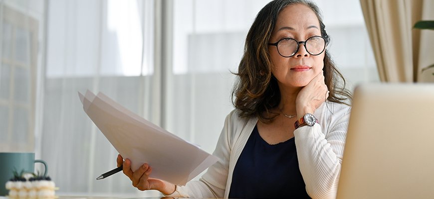 Insurance agent looking at a computer