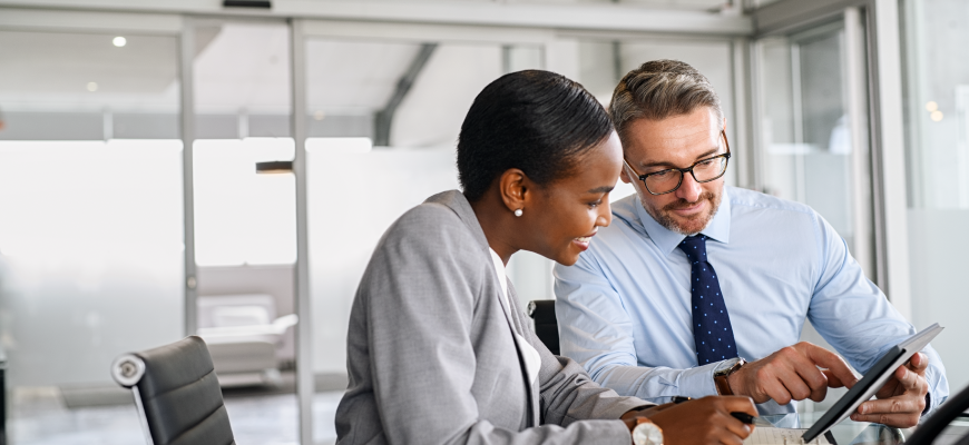 People working together at a computer 