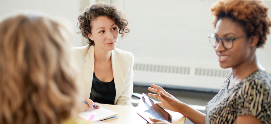 Insurance agent speaking to group benefits client
