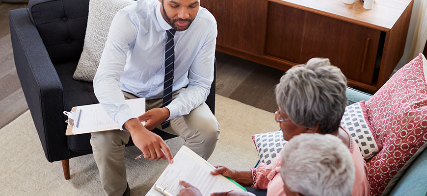 Medicare agent meeting with senior clients