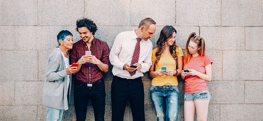 Members of different generations on their phones