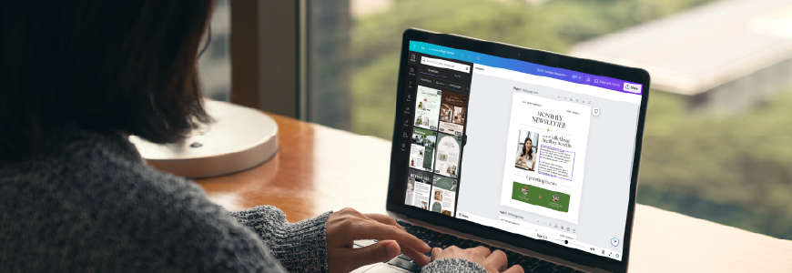 Person using Canva on laptop