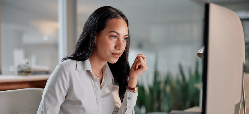 Insurance agent working on desktop computer